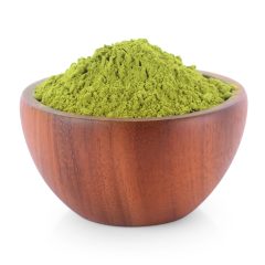 powdered matcha green tea in bowl, isolated on white background